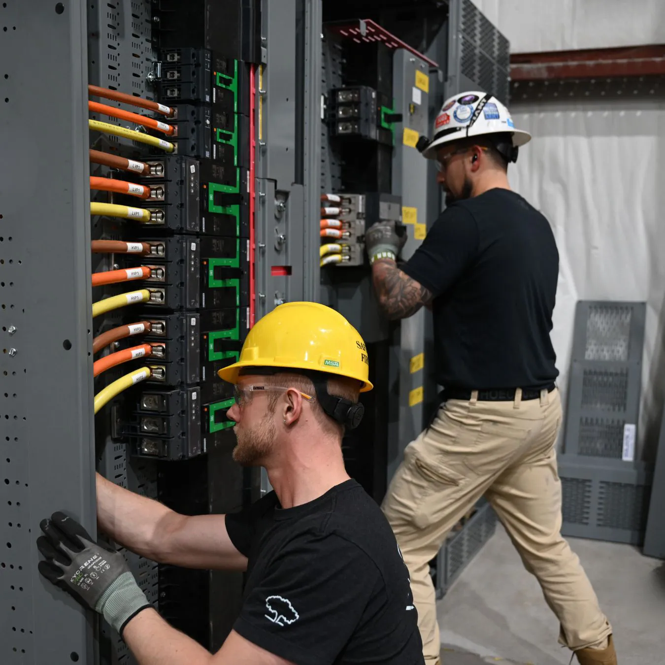 Technician installing primary power