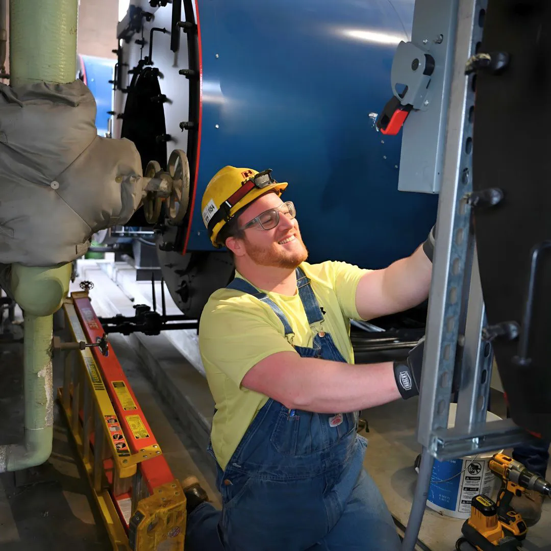 Technician installing metal support